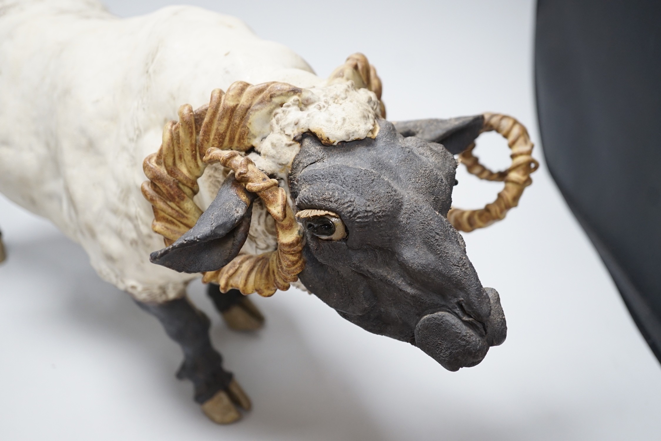 A British studio pottery model of a ram, 56cms long x 28cms high
